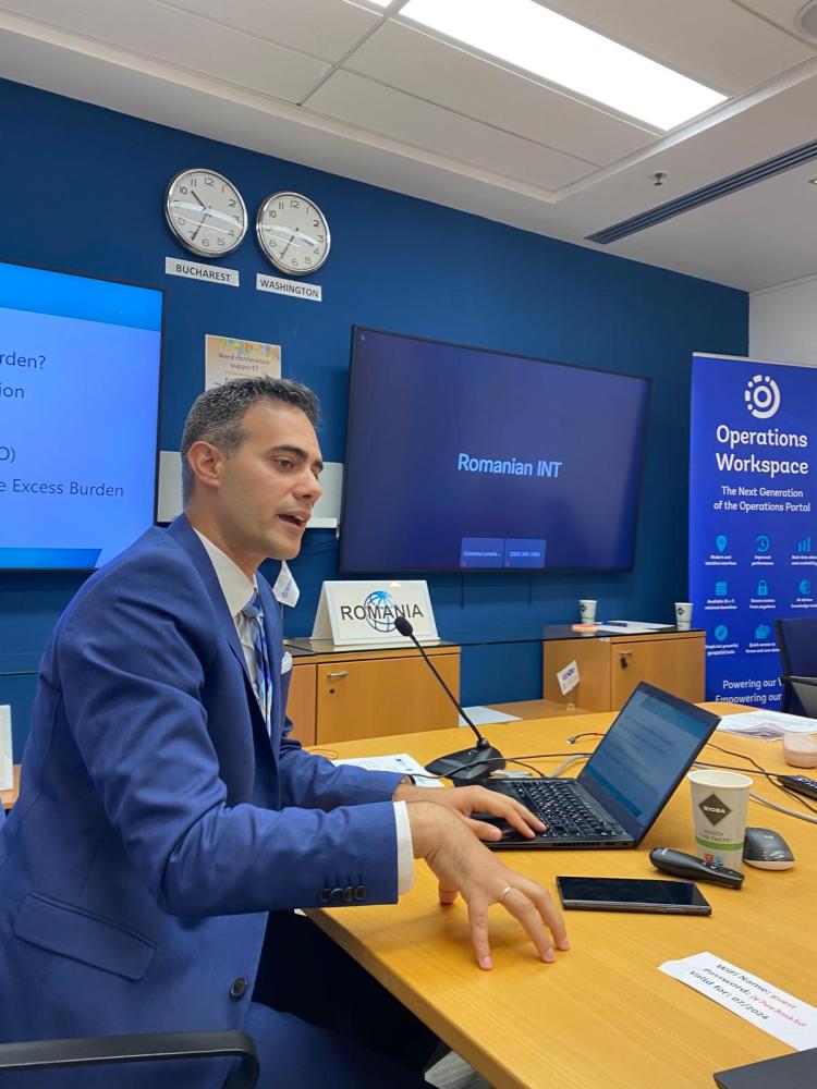 Guy Mor delivering presentation during a high-level summit