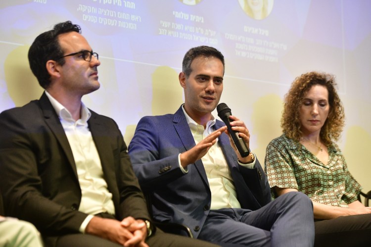 Guy Mor speaking as a participant in a senior panel discussion about regulatory reforms.
