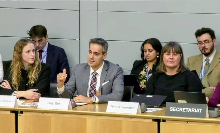 Guy Mor presenting as keynote speaker at an OECD public policy meeting on regulatory sandbox frameworks
