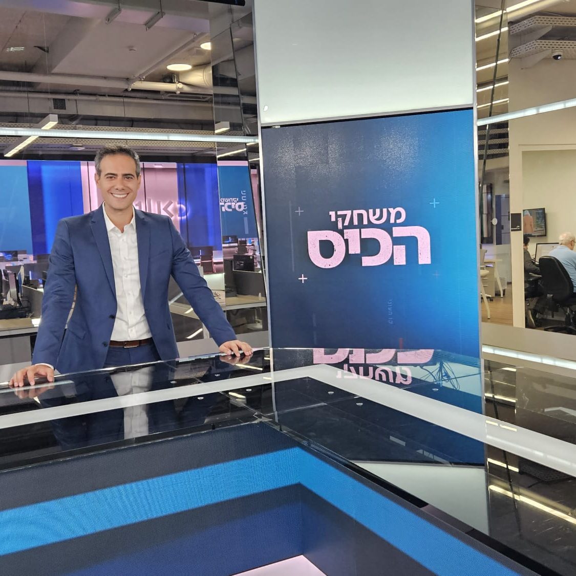 Guy Mor, a leading public policy and regulation expert, appearing on a TV news broadcast to discuss national regulatory reforms.