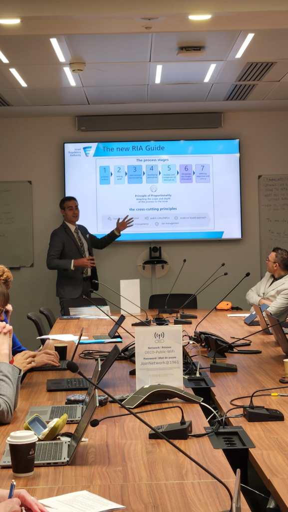 Guy Mor leading a professional workshop on regulatory policy with government officials and experts