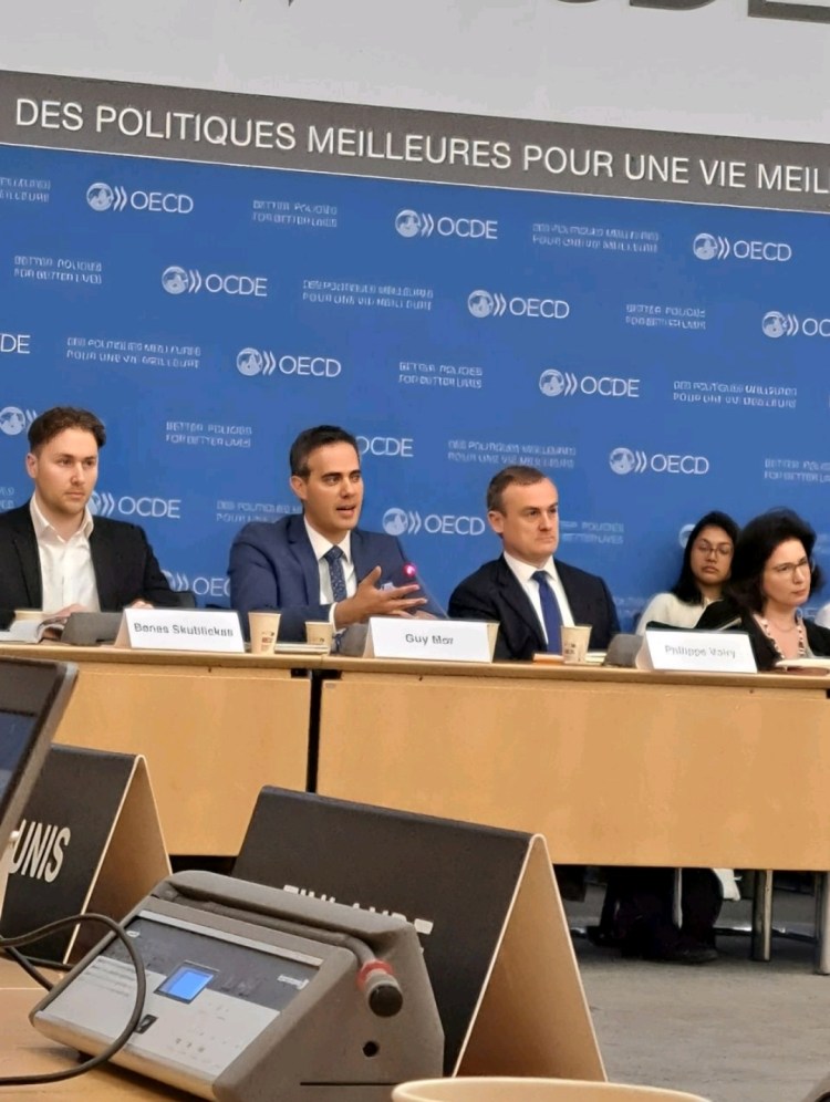 Guy Mor sharing his expertise as a panelist during a professional conference on public policy.