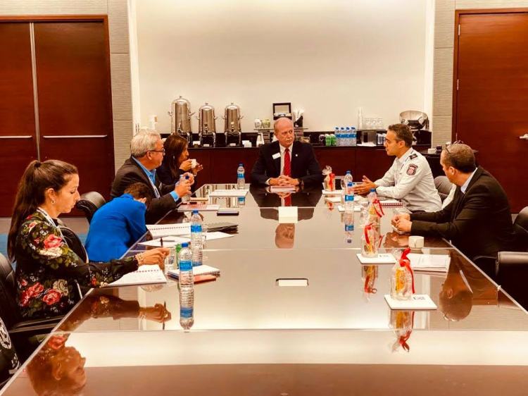 Guy Mor, a public safety regulation officer, speaking about risk mitigation strategies in fire safety during a formal international meeting.